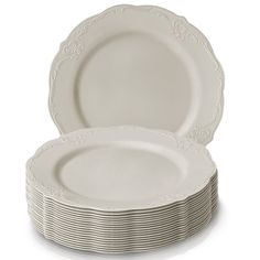 a stack of white plates on a white background