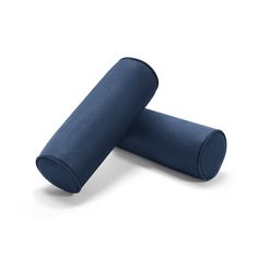 two rolled up blue yoga mats sitting on top of each other in front of a white background