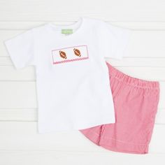 This short set is the perfect playwear this season! Features hand smocked footballs on a white knit top and coordinating red gingham short. #smockedauctions #boysfashion #football #smocked #red #gingham #fall #shortset #champagnetastesippycupbudget White Knit Top, Gingham Shorts, Sport Football, Short Set, Short Sets