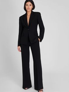 A cinched waist gives the signature wear-everywhere blazer a strong feminine feel. Sharply tailored with notched lapels and a single-button closure.