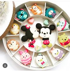 the facebook page is full of mickey mouses and other disney character figurines