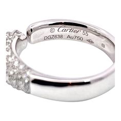 This is part of Chairish’s Fine Jewelry assortment.  Cartier Panthere Ring  This ring is new and a variation on the standard Diamond Head Panthere. It is smaller in diameter as it is thinner than the standard ring. Like most of the Panthere Collection has been revised and made smaller for less expensive pieces this is one. This is fully hallmarked Cartier 55 AU 750 DGZ 638. It is stackable as I said it is thinner than most and of course less expensive. This is 4.48mm the Head is 6.29mm it has em Cartier Panthere Watch Diamond, Cartier Panthere Watch Silver, Cartier Panther Ring, Cartier Necklace Panther, Cartier Panther, Emerald Eyes, Cartier Panthere, Diamond Head, Wedding Band Sets