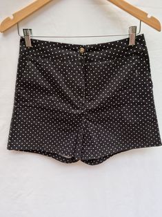 Black and white polka dot shorts by the brand Princess Highway. Shorts have a zip fly front button opening and slanted side seam pockets. Comes with a spare button. Please note- measurements are taken from the actual garment and are approximates. Size 10 Measurements- Waist (top of front w/b) 36cm Hips approx. (front) 45cm (back) 49.5cm Length (side seam to hem) 35cm Rise 70cm Width of leg (front) 30cm Brand- Princess Highway Condition- This item is 2nd hand but in good condition. Thanks so much for stopping by! Please feel free to message me for any information or questions. Princess Highway, Short A, Polka Dot Shorts, White Polka Dot, Short Outfits, Polka Dot, Polka Dots, Bathing Beauties, Size 10