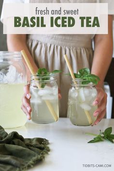 two mason jars filled with fresh and sweet basil iced tea