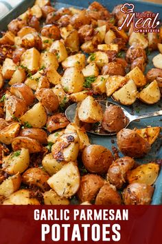 garlic parmesan potatoes on a baking sheet with a spoon in it and the title overlay reads garlic parmesan potatoes