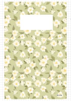 a green and white flowered paper with a hole in the middle for an image