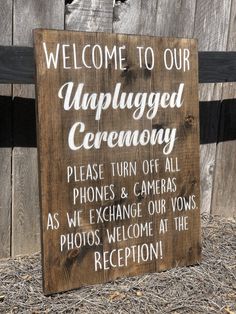 a wooden sign that says, welcome to our unplugged ceremony