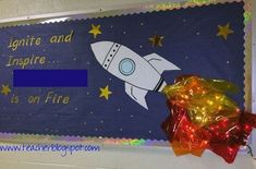 a bulletin board with a rocket on it