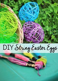 colorful string easter eggs sitting on top of a table