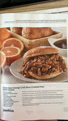 an article in the cookbook shows pulled pork sandwich with oranges and cranberry sauce