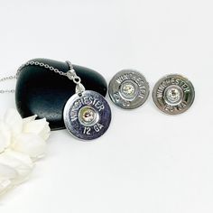 Shotgun Shell 12 Gauge Jewelry gift set includes 20 gauge earrings and 12 gauge necklace your choice of Birthstone Crystals. The earrings have stainless steel ear post nickel free. The necklace is 18 inch stainless , Sterling Silver Bail, for a custom length just leave in a note at checkout This Gift Set is available in Winchester or Remington Shells. A great gift for her, Girlfriend, made simple but a little rustic in style. Makes a great Bridesmaids gift!! Ask me about multi DISCOUNTS I CAN HE Shotgun Necklaces, Odd Jewelry, Gauge Jewelry, Shotgun Shell Jewelry, Bullet Casing Crafts, Bullet Casing Jewelry, Shell Creations, Bullet Crafts, Birthstone Crystals