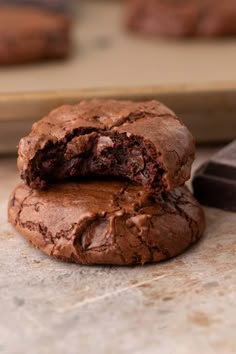 two chocolate cookies sitting on top of each other