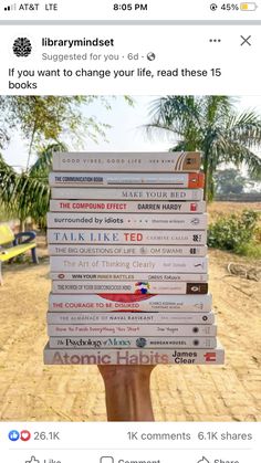 someone holding up a stack of books in front of their face and the caption reads, if you want to change your life, read these 15 books