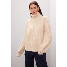 Off-white knit (66% Acrylic, 12% Polyester, 10% Nylon, 8% Wool, 4% Alpaca). Sweater. Long sleeves. Turtleneck. Pull on. 24" from shoulder to hemline. Imported. Cream Sweater For Workwear In Winter, Off White Textured Knit Sweater For Fall, Cream Turtleneck Sweater For Fall, Cream Knit Top For Fall, Cream Sweater For Cold Weather And Fall, Cream Sweater With Textured Knit For Cold Weather, Cream Textured Knit Sweater For Cold Weather, Cream Wool Sweater For Fall, White Cable Knit Outerwear For Work