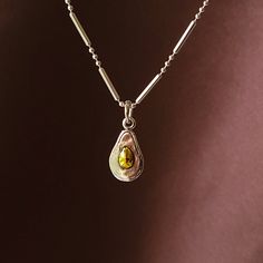 Silver avocado charm pendant with 24K gold plate. Highly detailed Avocado made from solid 925 sterling silver. The pit is plated in 24K gold  The charm is oxidized to enhance the detail. It comes with a jump ring to easily add it to existing jewelry.  Option to purchase a sterling 925 silver chain necklace. Approximate weight: 3.6 grams Use and care:  Please remove necklace before performing physical activity such as bathing, exercising (including swimming), house cleaning, gardening, and cookin Bff Necklaces For 2 Avocado, Beaded Avocado, Avocado Necklace, Egg Necklace, Avocado Keychain, Gold Gold, Silver Chain Necklace, Jump Rings, Sterling Silver Charm