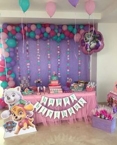 a birthday party with balloons and decorations