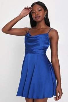 You'll keep everyone on their toes with your style when they see you wearing the Lulus Fanciful Flirt Royal Blue Satin Cowl Neck Skater Mini Dress! Sleek woven satin shapes a sleeveless bodice and a cowl neckline that falls from adjustable spaghetti straps. A high, fitted waist tops a twirly skater skirt that ends at a cute mini hem. Hidden back zipper/clasp. Fit: This garment fits true to size. Length: Mid-thigh. Size medium measures 29" from adjustable straps to hem. Bust: Great for any cup si Royal Blue Mini Dress, Satin Skater Dress, High Neck Prom Dress, Skater Mini Dress, Lulus Dress, Blue Skater Dress, Lulu Fashion, Adhesive Bra, Mini Skater Dress