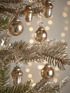 a christmas tree with ornaments hanging from it