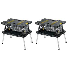 two black and yellow tables sitting on top of each other in front of a white background