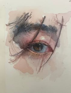 an eye is shown with watercolor on paper