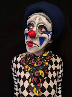 The Sad Clown Mask pays homage to the timeless archetype that has graced stages and circus tents for centuries. Inspired by the melancholic Pierrot of French pantomime and echoing the poignant depth of Lon Chaney's Laugh, Clown, Laugh, this mask captures the paradox of comedy and tragedy. The sad clown is a figure who hides tears behind a painted smile, embodying the delicate balance of humor and heartache. Meticulously detailed with traditional 19th-century clown makeup, this full-face mask inv Circus Tents, Lon Chaney, Clown Mask, Comedy And Tragedy, Circus Performers, Circus Tent, Pantomime, Full Face Mask, Costume Masks