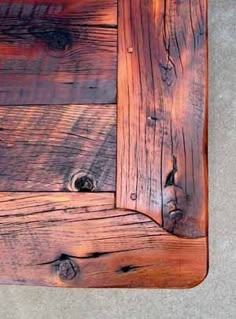 a wooden cutting board sitting on top of a counter