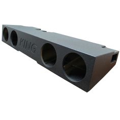 an image of a black speaker with two holes in the front and one hole in the back