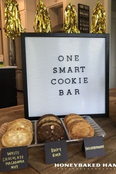 a sign that says, one smart cookie bar with many different types of baked goods