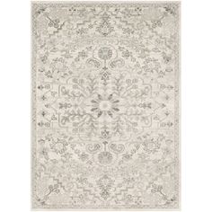 a white rug with an ornate design on the top and bottom, in grey tones