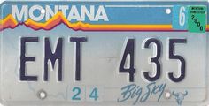 a license plate with the word montana written in blue and yellow on it's front