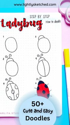 a ladybug drawing on top of a sheet of paper next to some scissors