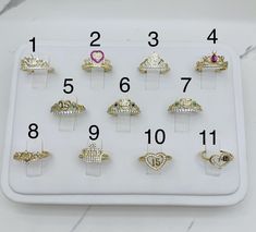 ❤️ 10k solid gold ring sweet 15 crown tiara heart ❤️ Stones are cubic zirconias ❤️ Fine Jewelry  ❤️ Gold authentic  STYLE 1 - Size 7 or 7.5 - SKU 06984 - White  STYLE 2 - Size 7 - SKU 051264 - Pink fuchsia tiara STYLE 3 - Size 8 - SKU 05914 - White  STYLE 4 - Size 7.5 - SKU 051334 - Red  STYLE 5 - Size 7 or 7.5 - SKU 051334 - Light blue  SYYLE 6 - Size 7.5 - SKU 051334 - Dark blue STYLE 7 - Size 7.5 - SKU 051194 - Green STYLE 8 - Size 8 - SKU 051052 Pink  STYLE 9 - Size 6 - SKU 051194 - White crown STYLE 10 - Size 8 - SKU 051054  Heart STYLE 11 - SIZE 7 SKU 05844 - Heart Please inquire if other ring size is needed before purchasing  ❤️ Anillo de quince años de 10 Kilates oro sólido  ❤️ Piedras son zirconias  ❤️ Anillo de corona quinceañera  ❤️ Joyeria fina ❤️ Oro autentico  ESTILO 1 - Tama Cute Cheap Rings For Birthday, Gem Rings Stones Quinceanera, 15 Rings Quinceanera, Quince Rings, Heart Stones, 15 Rings, Schmuck Gold, 10k Gold Ring, Crown Tiara