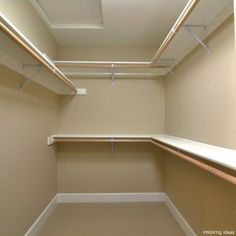 an empty walk in closet with no doors