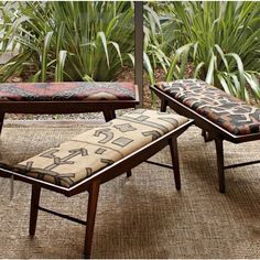 an ottoman and footstool are sitting on the ground in front of some plants