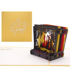 a greeting card with an intricately designed box