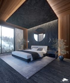 a bedroom with a large bed in the middle of it and a round mirror on the wall