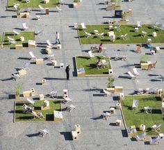 an aerial view of lawn chairs and people