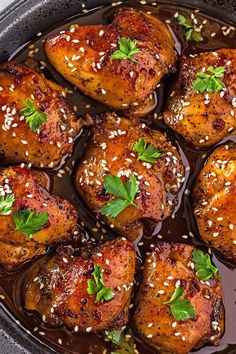 chicken with sesame seeds and garnish in a skillet