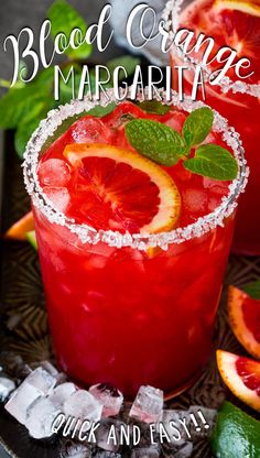 blood orange margarita with ice and mint garnish