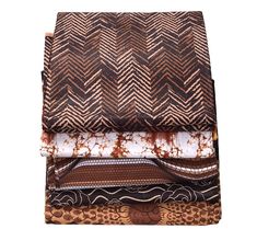 four pieces of african print fabric stacked on top of each other