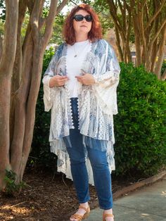 Western boho Lace duster, Plus Size kimono, plus size cover up, western lace kimono, beach coverup, plus size kimono, longhorn duster, vintage Sizes small to 3x  Standard U.S. Womens sizing small medium large extra large 2x 3x Sizing: Small 4-6 Medium 8-10 Large 12-14 Xlarge 16-18 2x 20-22 3x 24-26 *Full refund within three days of delivery if not satisfied *GREAT flexible fit for many body shapes.  Wear open or closed. *Easy layer every season, dress it up or down. Wear it with leggings, jeans, skirts, dresses, shorts and more!  *Style with your favorite pair of boots or sandals.  If you are looking for a unique boho style you have found the right Etsy store.  Follow us on Tic Toc, Instagram and Facebook for style options Oversized Bohemian Open Front Kimono, Bohemian Long Duster For Beach Cover-up, Oversized Bohemian Cover-up With Open Front, Bohemian Spring Beach Duster Cover-up, Bohemian Open Front Duster For Festival, Oversized Long Bohemian Cover-up, Oversized Bohemian Open Front Cover-up, Bohemian Oversized Open Front Cover-up, Bohemian Shawl Kimono One Size