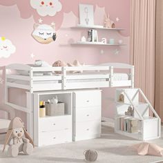 a child's bedroom with pink walls and white furniture