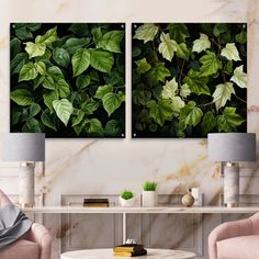 two green plants are on the wall in this living room with pink chairs and a coffee table