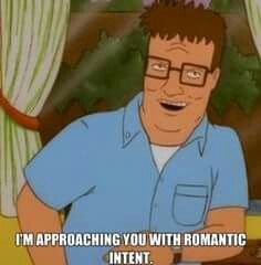 an image of a man with glasses on sitting in front of a computer screen that says, i'm approaching you with romantic interest