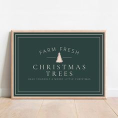 farm fresh christmas trees have yourself a merry little christmas sign on the floor in front of a white wall