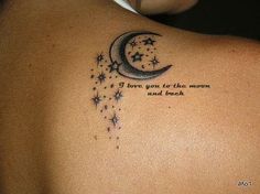 a woman with a crescent and stars tattoo on her back