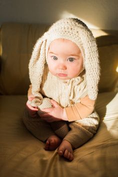 "What's more precious then a bunny bonnet? This bonnet makes such a cute Easter accessory, bunny costume or worn year round just because it's so cute! Add it to your kids Easter baskets or give as a gift. The bonnet it made with soft acrylic yarn and comes in 4 colors. White, linen(shown), grey and tan. If you would like a custom colo, please choose other in the drop down menu and send me a message before checkout. The bonnet comes in 6 sizes from NB-5y. Size chart: NB- fits up to 4 weeks 0-3m- Bunny Bonnet, Crochet Garland, Kids Easter Basket, Bunny Costume, Easter Hats, Bunny Hat, Easter Bonnet, Tassel Garland, Easter Kids