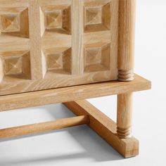 a close up of a wooden bench on a white background