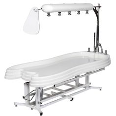 a hospital bed with an adjustable headrest and foot rest on it's side