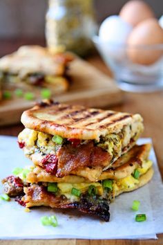 two breakfast sandwiches stacked on top of each other